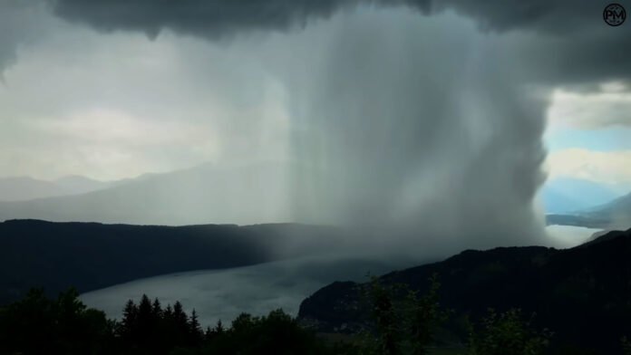 Heavenly Deluge Mesmerizing Timelapse Captures Natures Torrential Symphony Over Alpine Waters 1